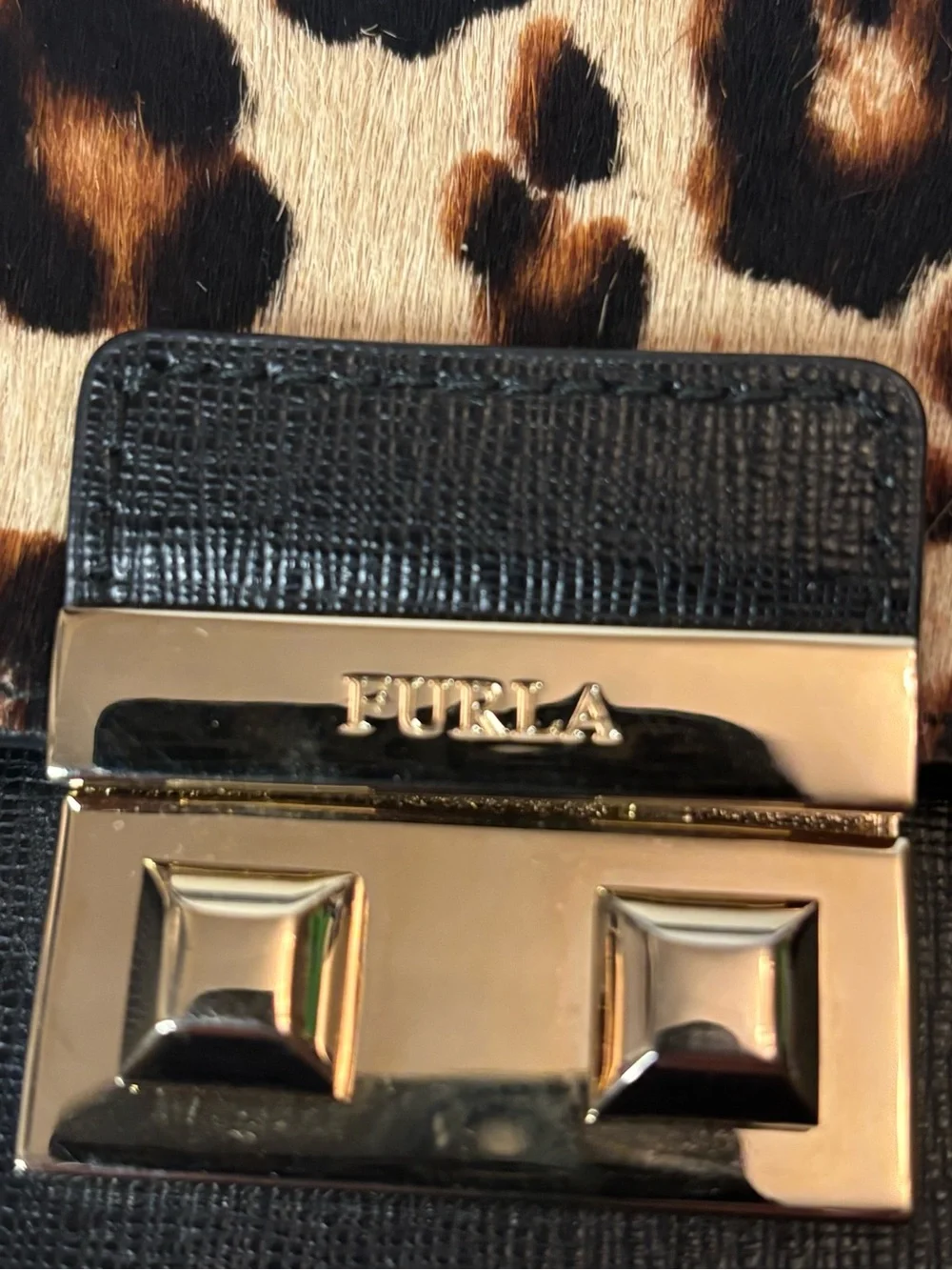Furla Bella mini crossbody with leopard print calf hair and leather. Adjustable